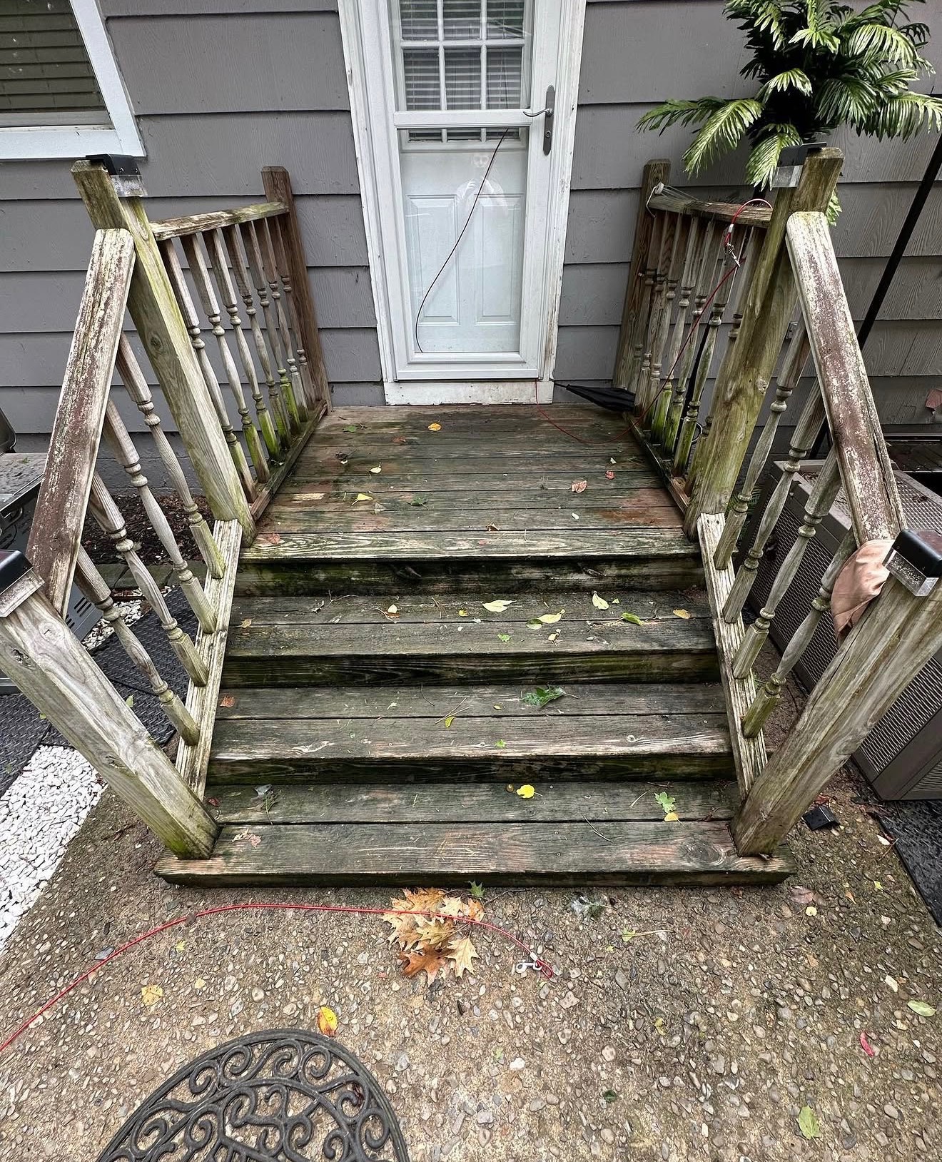 Weathered wood deck before cleaning